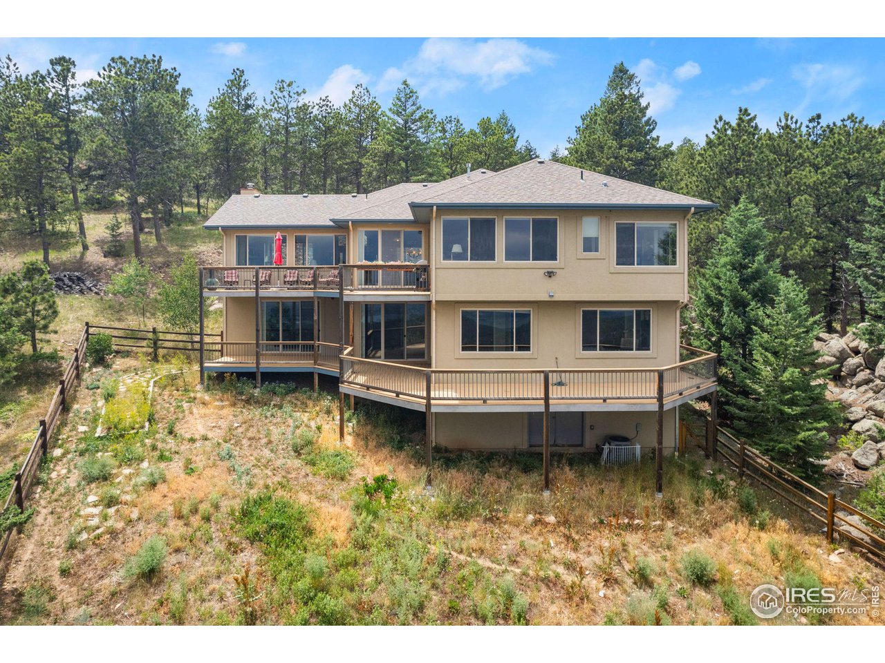 309 Sunrise Lane Boulder, CO 80302 - Photo 39 of 40 a house view with a garden space