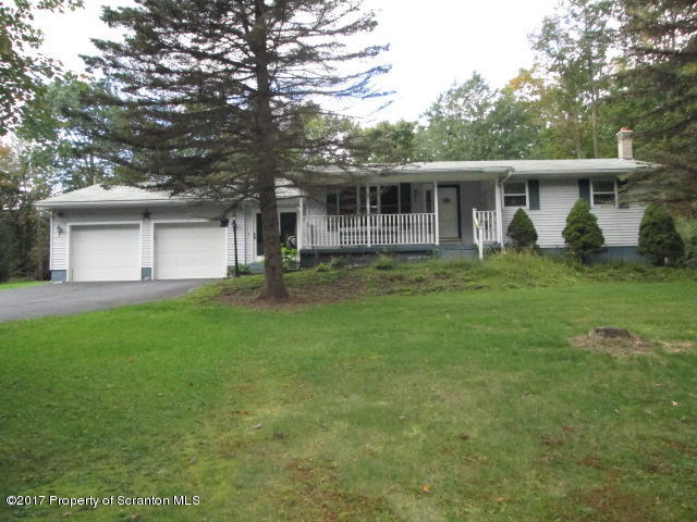 23 Swoyer Road Lake Ariel, PA 18436 - Photo 1 of 28 a front view of house with yard and green space