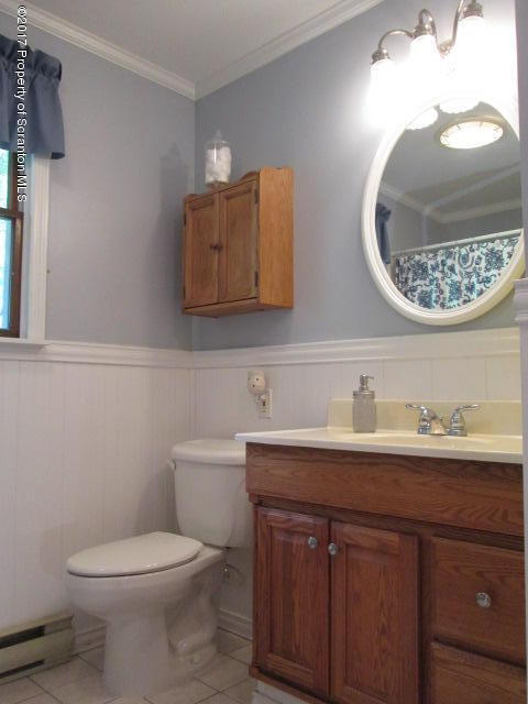 23 Swoyer Road Lake Ariel, PA 18436 - Photo 18 of 28 a bathroom with a toilet sink and mirror