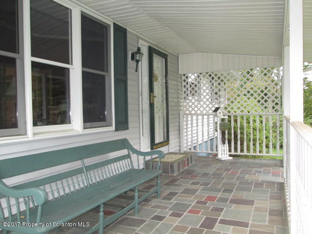 23 Swoyer Road Lake Ariel, PA 18436 - Photo 19 of 28 a front view of a house with a garden