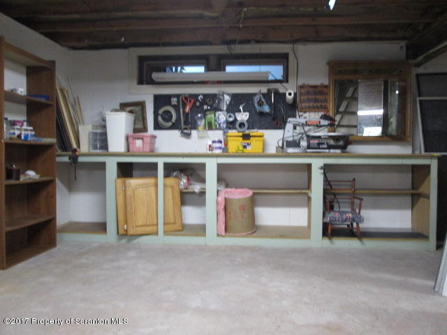 23 Swoyer Road Lake Ariel, PA 18436 - Photo 26 of 28 a kitchen with a wooden floor