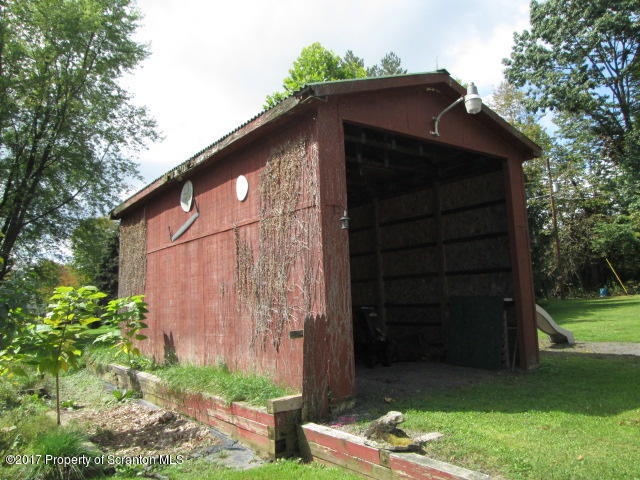 23 Swoyer Road Lake Ariel, PA 18436 - Photo 28 of 28 a front view of a house with a yard
