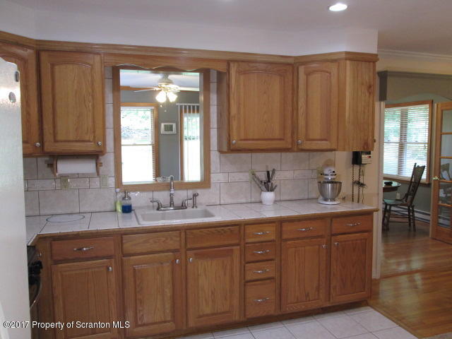 23 Swoyer Road Lake Ariel, PA 18436 - Photo 4 of 28 a bathroom with a sink and a mirror