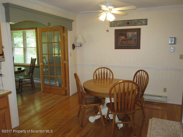 23 Swoyer Road Lake Ariel, PA 18436 - Photo 5 of 28 a view of a dining room with furniture window and wooden floor