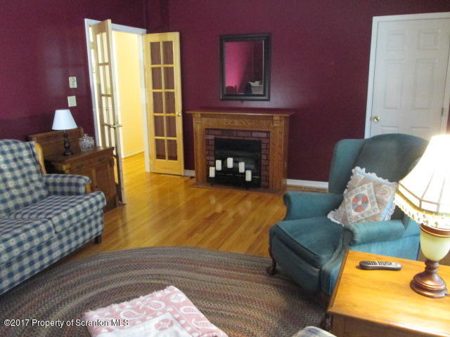 23 Swoyer Road Lake Ariel, PA 18436 - Photo 10 of 28 a living room with furniture and a fireplace