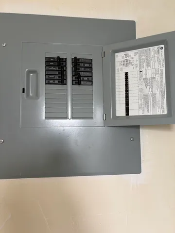a white refrigerator freezer sitting inside of a kitchen