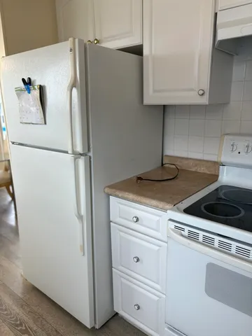 a view of swimming pool from a lake view