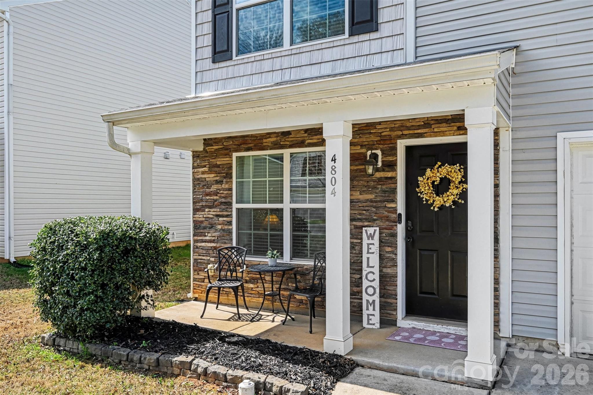 4804 Manchineel Lane Monroe, NC 28110 - Photo 1 of 28 a front view of a house with a porch