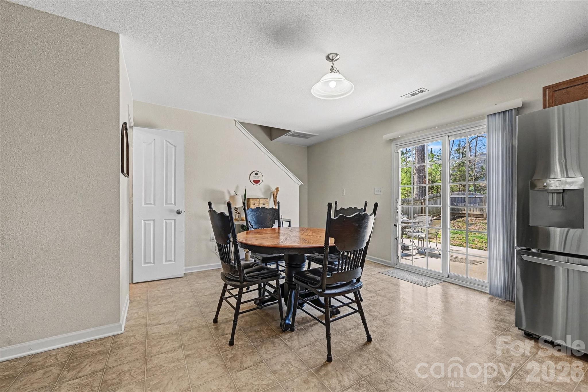 4804 Manchineel Lane Monroe, NC 28110 - Photo 13 of 28 a view of a dining room with furniture window and outside view