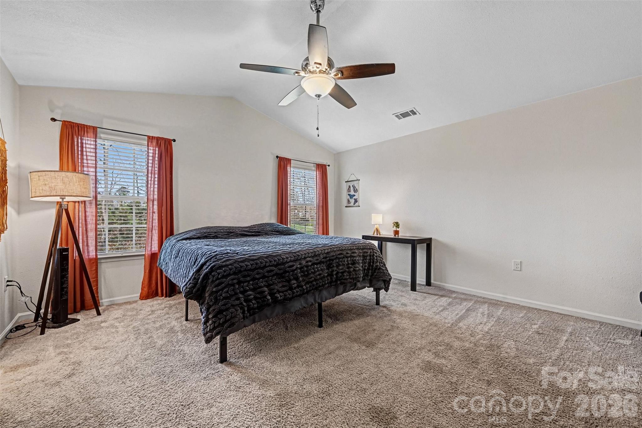 4804 Manchineel Lane Monroe, NC 28110 - Photo 15 of 28 a bedroom with a bed and a walk in closet
