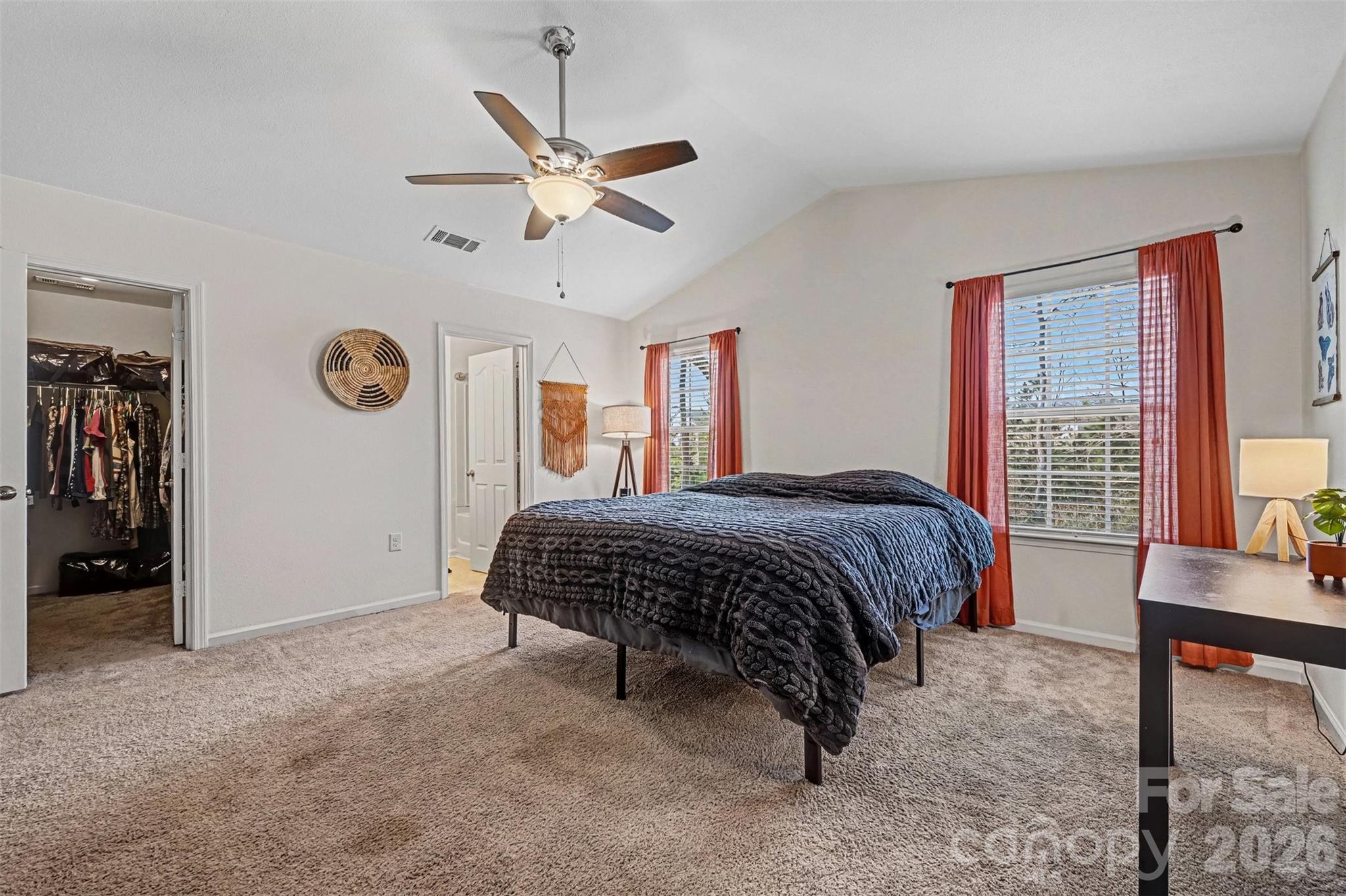 4804 Manchineel Lane Monroe, NC 28110 - Photo 16 of 28 a spacious bedroom with a bed a dresser and a window