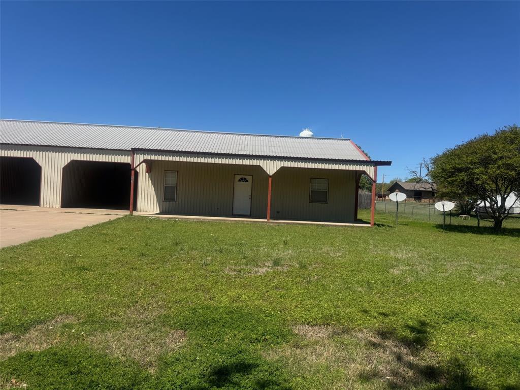 202 East 3rd Street Tolar, TX 76476 - Photo 1 of 1 a view of a house with a yard