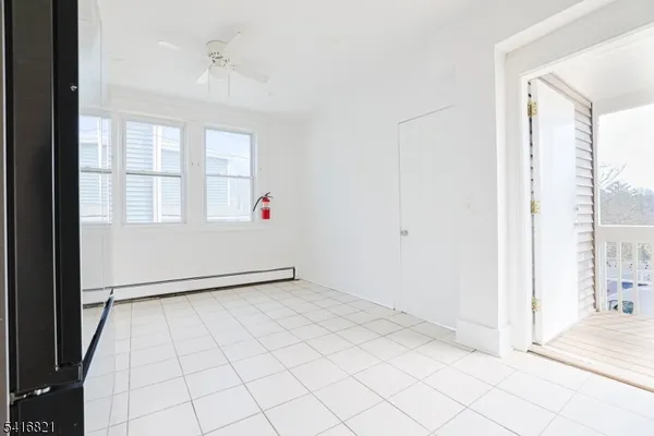 a view of an empty room and window