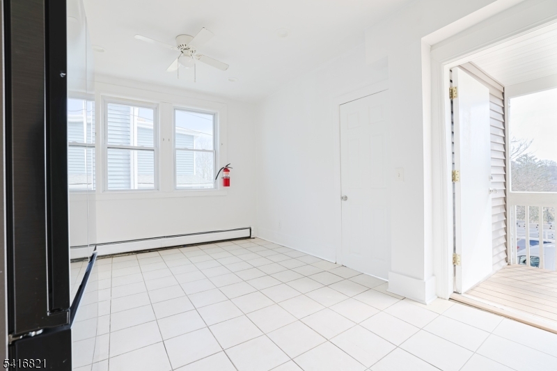 58 Prospect Street, Unit A Dover, NJ 07801 - Photo 9 of 10 a view of an empty room and window