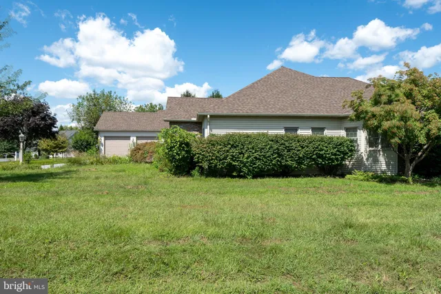 a view of a house with garden