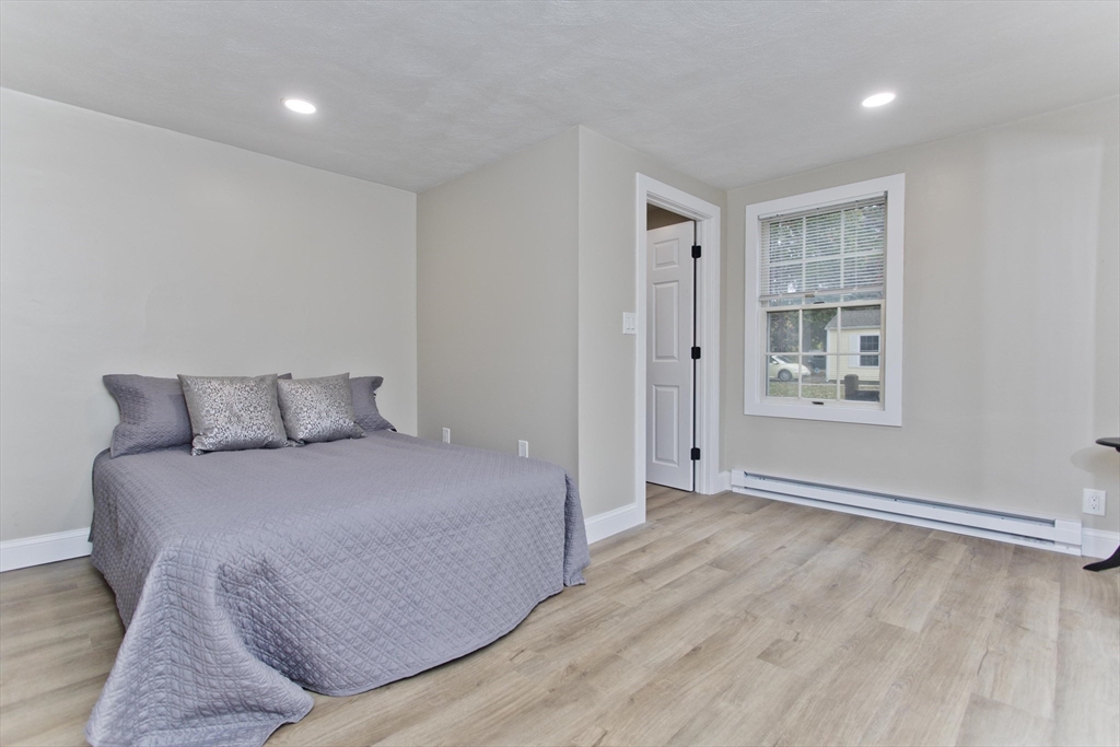 8 Maynard Road Wilbraham, MA 01095 - Photo 24 of 39 a room with a bed and a window