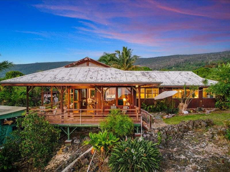 84-5193 Hawaiʻi Belt Road Captain Cook, HI 96704 - Photo 13 of 30 front view of a house with a yard