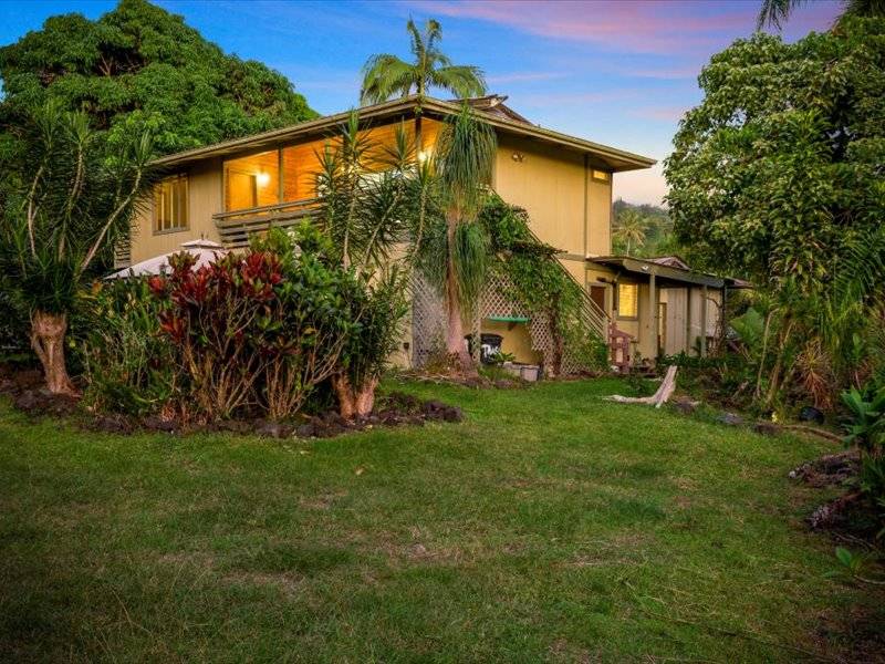 84-5193 Hawaiʻi Belt Road Captain Cook, HI 96704 - Photo 15 of 30 a view of a house with a yard