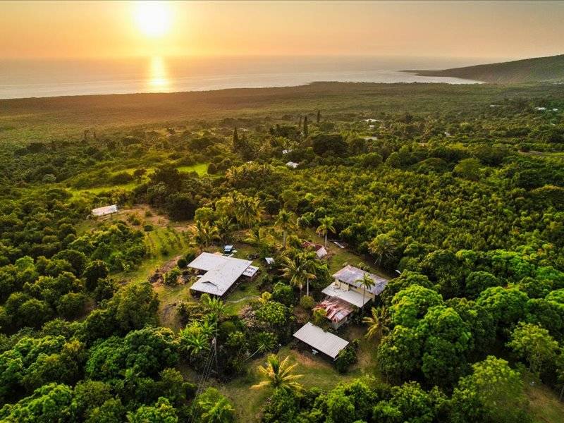 84-5193 Hawaiʻi Belt Road Captain Cook, HI 96704 - Photo 30 of 30 an aerial view of residential building with parking space