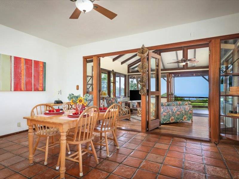 84-5193 Hawaiʻi Belt Road Captain Cook, HI 96704 - Photo 6 of 30 a dining room with furniture and window