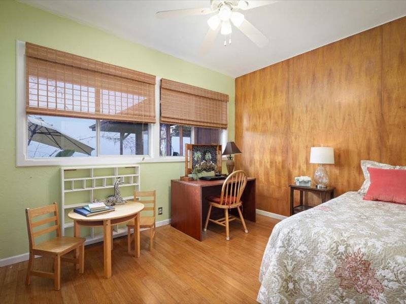 84-5193 Hawaiʻi Belt Road Captain Cook, HI 96704 - Photo 10 of 30 a dining room with a wooden table and chairs