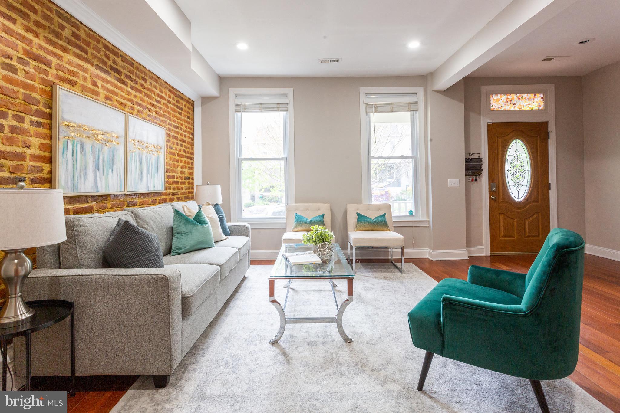19 Bryant Street Northeast Washington, DC 20002 - Photo 1 of 44 Living room looks out to inviting porch
