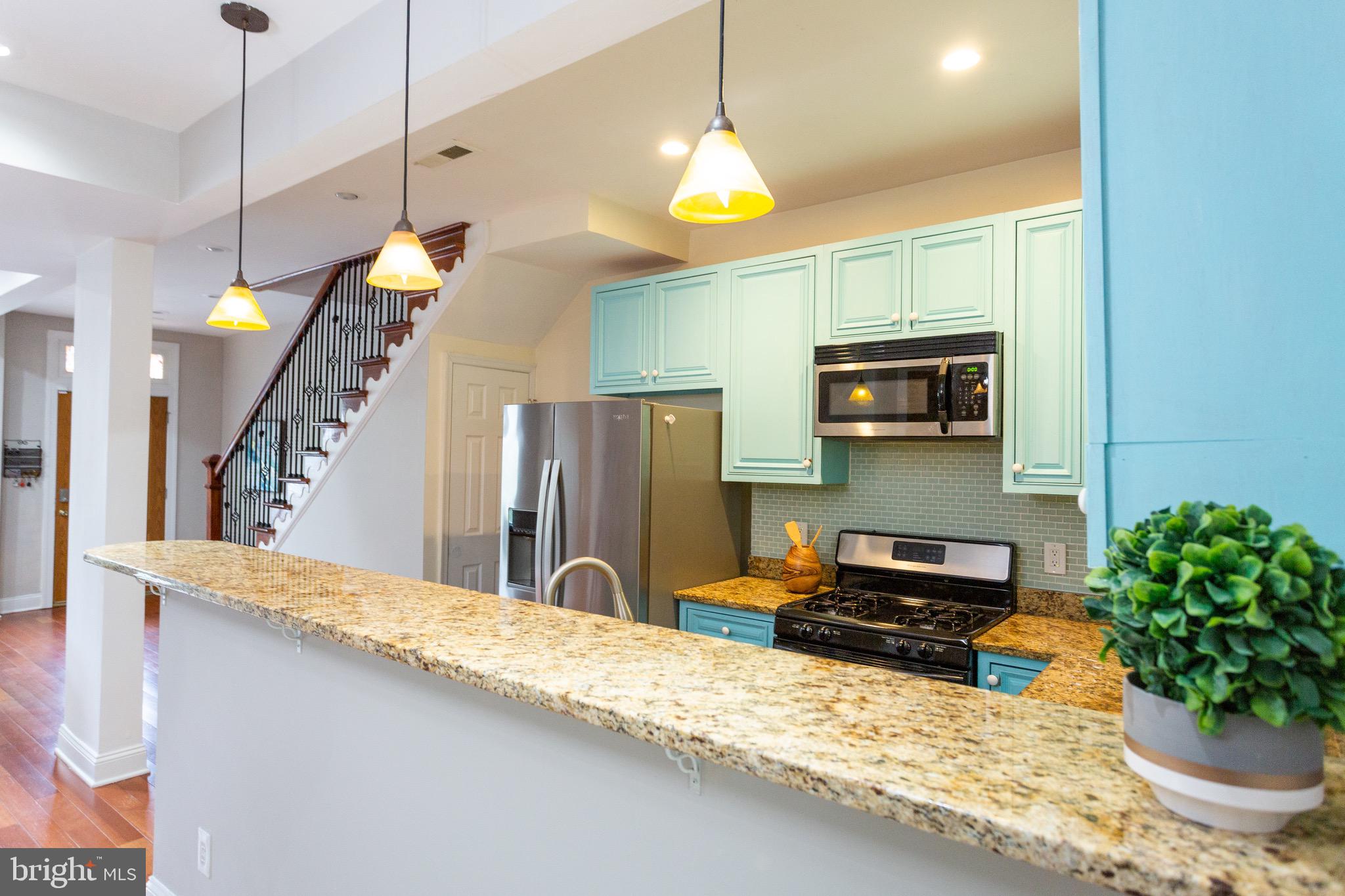19 Bryant Street Northeast Washington, DC 20002 - Photo 10 of 44 Granite counters & ample storage