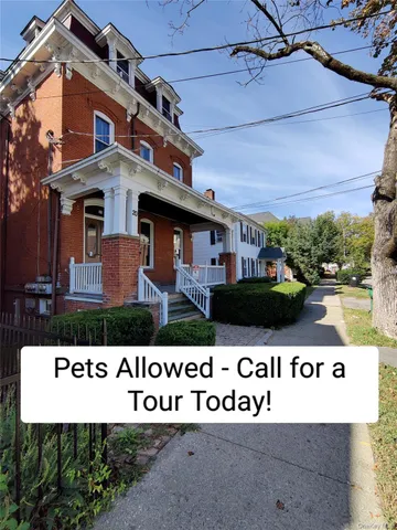 a sign that is on the wall of building