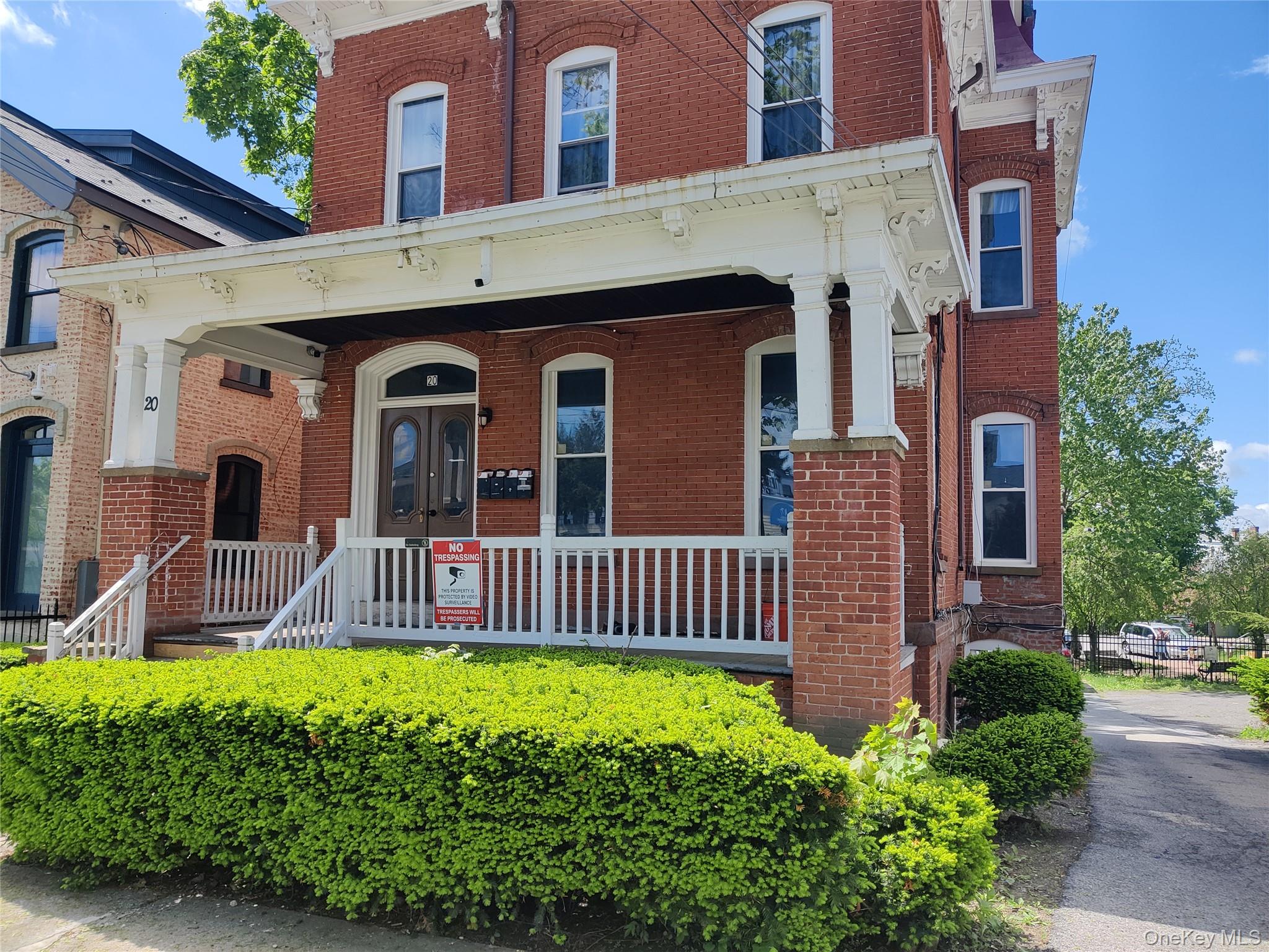 20 Noxon Street, Unit 1 Poughkeepsie, NY 12601 - Photo 3 of 15 a front view of a house with garden