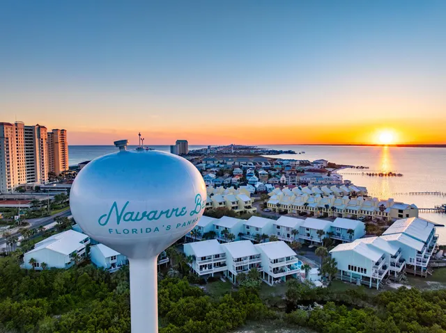 a view of a terrace with a table and chairs