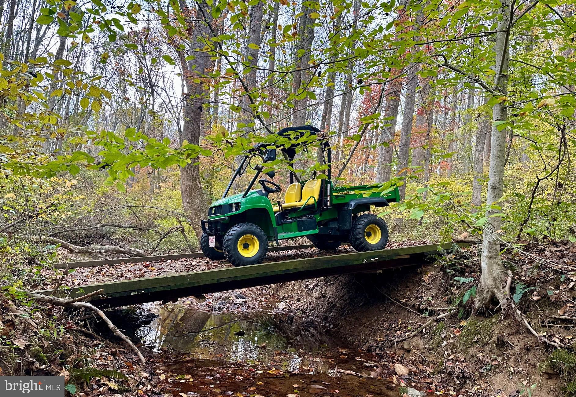 7049 Mink Hollow Road Highland, MD 20777 - Photo 62 of 72 Drive right over the creek on this bridge!