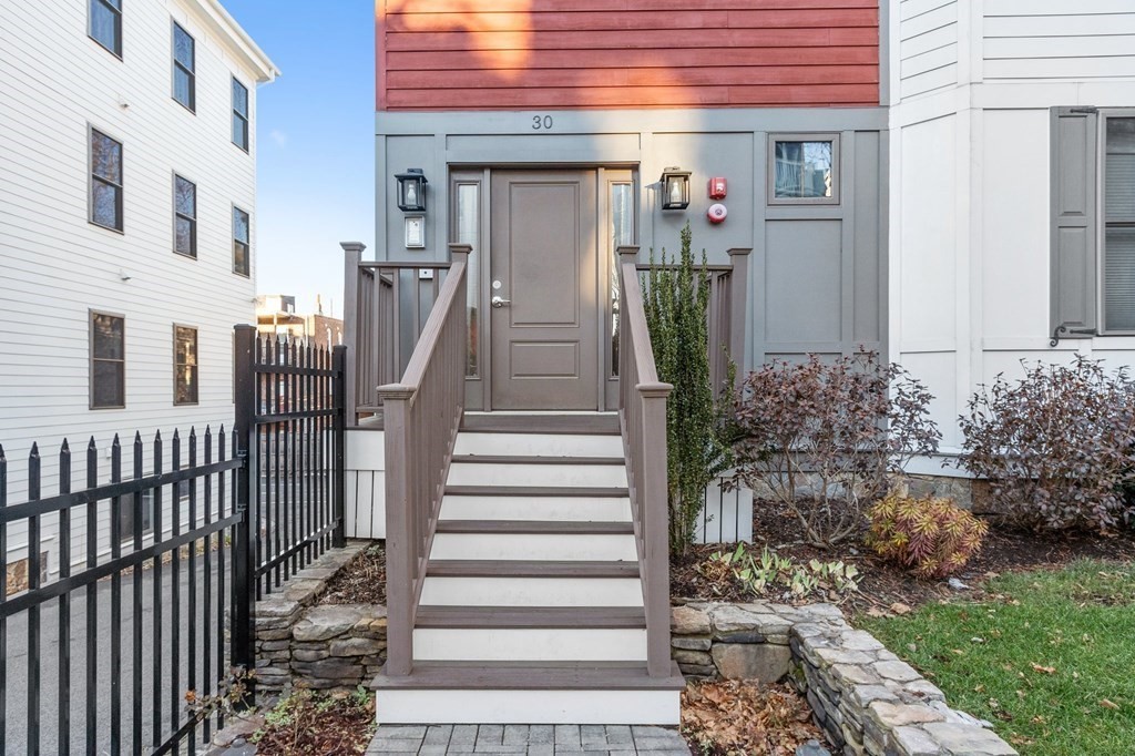 30 Iffley Road, Unit 1 Boston, MA 02130 - Photo 1 of 29 a view of a house with entryway and wooden floor