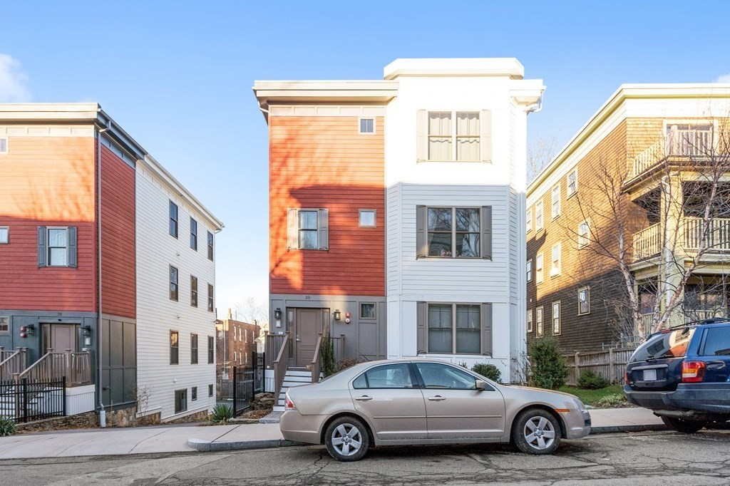 30 Iffley Road, Unit 1 Boston, MA 02130 - Photo 2 of 29 a car parked in front of a building