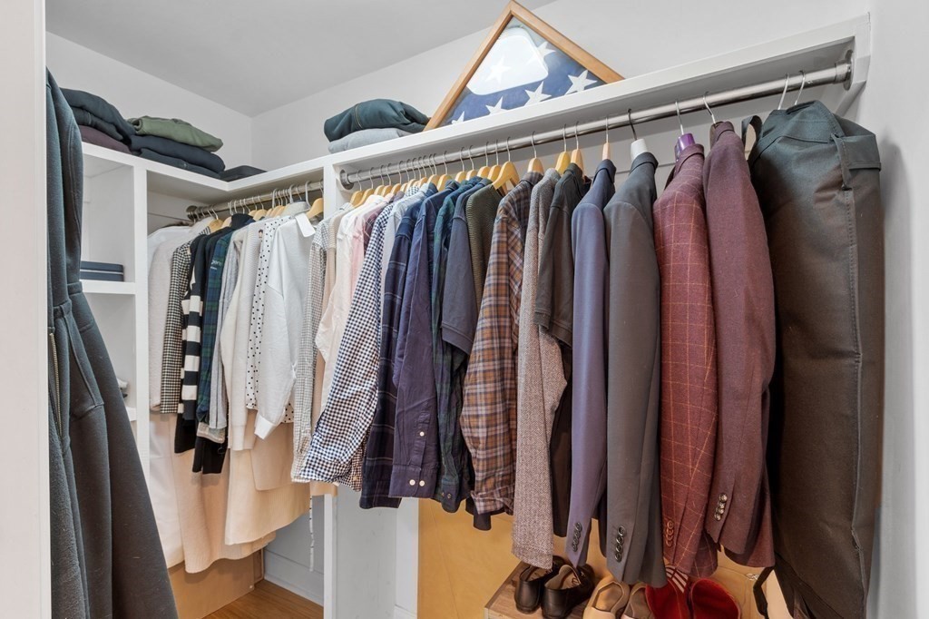 30 Iffley Road, Unit 1 Boston, MA 02130 - Photo 21 of 29 a view of walk in closet with clothes and shoes