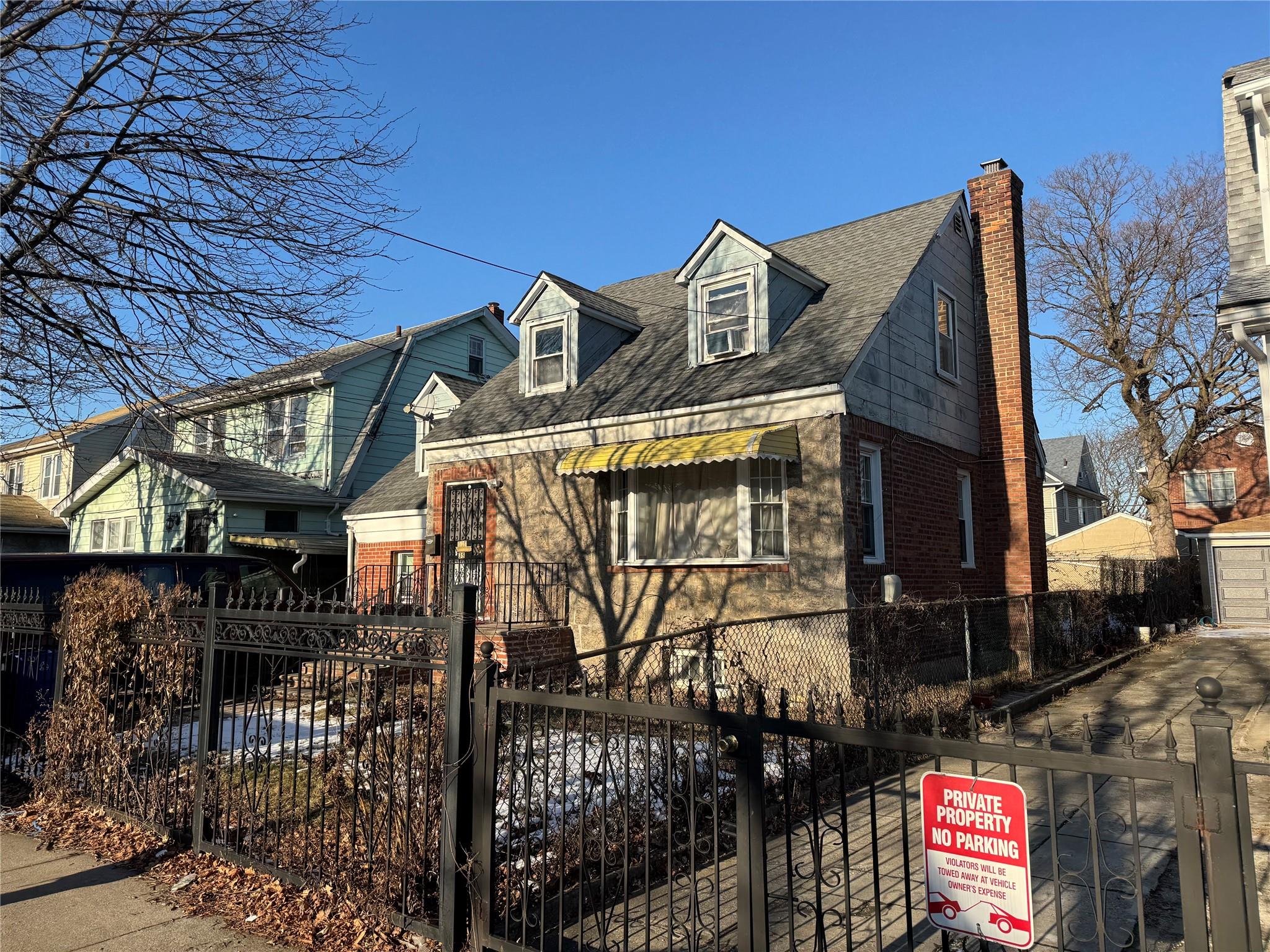 139-35 182s Street Queens, NY 11413 - Photo 2 of 3 a view of a house with glass windows