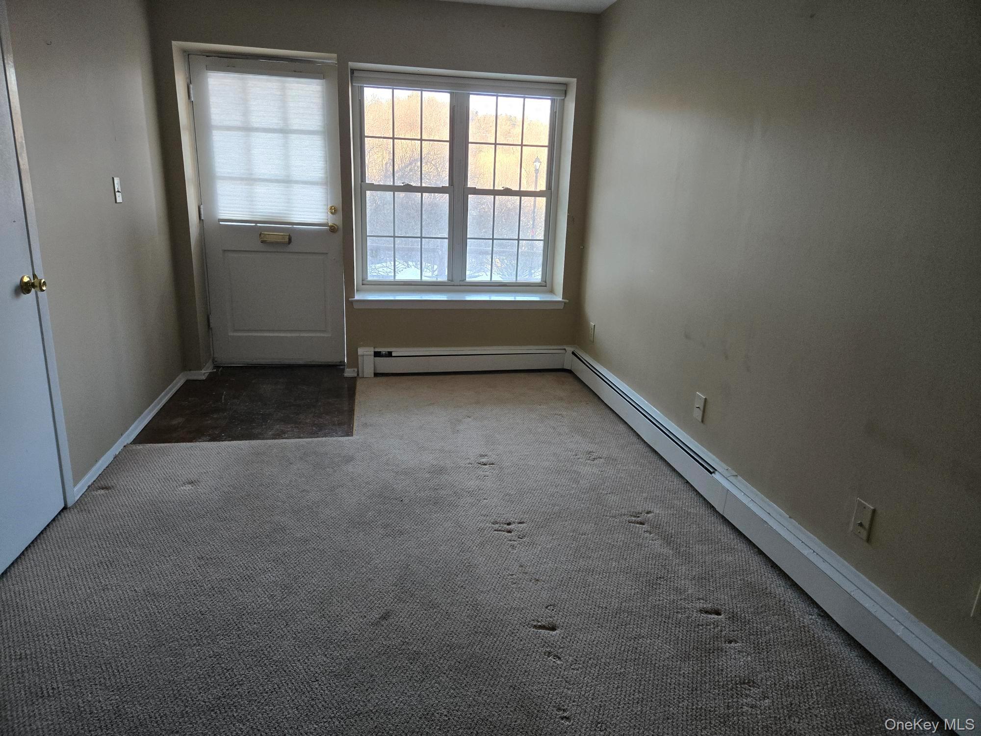 1840 Crompond Road, Unit 9A6 Peekskill, NY 10566 - Photo 22 of 22 The open floor plan includes a living room with dining area and open kitchen.