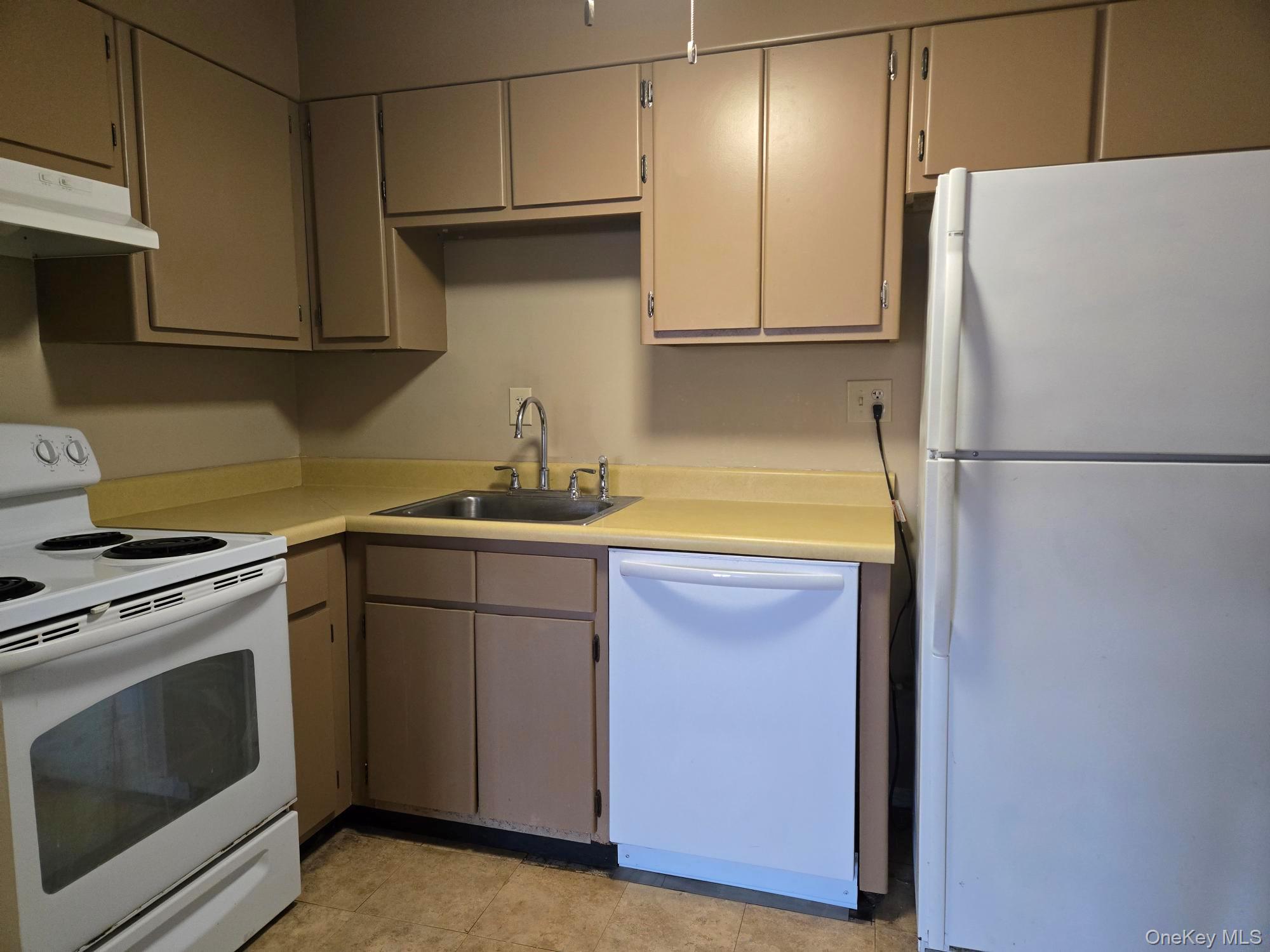 1840 Crompond Road, Unit 9A6 Peekskill, NY 10566 - Photo 6 of 22 The kitchen has ample cabinets for storage.