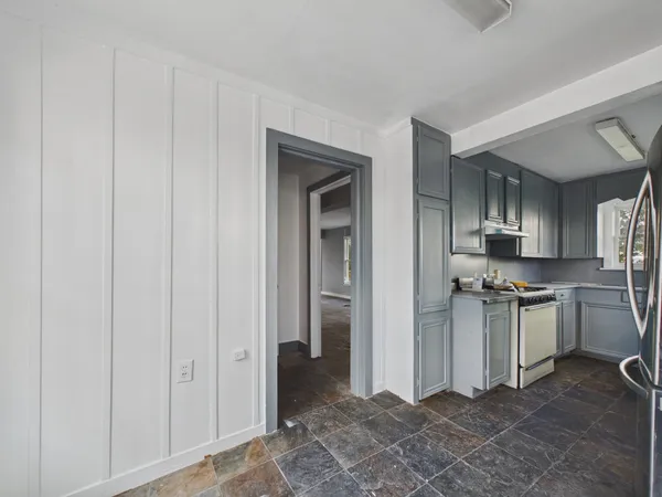 a view of a hallway view with staircase