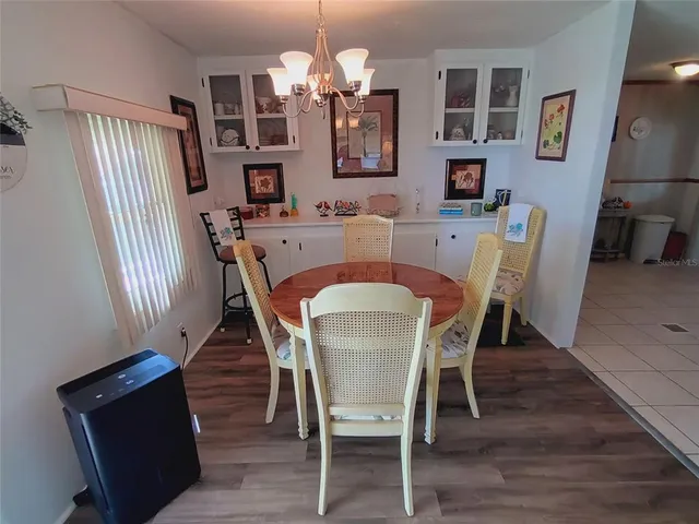 a kitchen with stainless steel appliances a stove a sink and a refrigerator