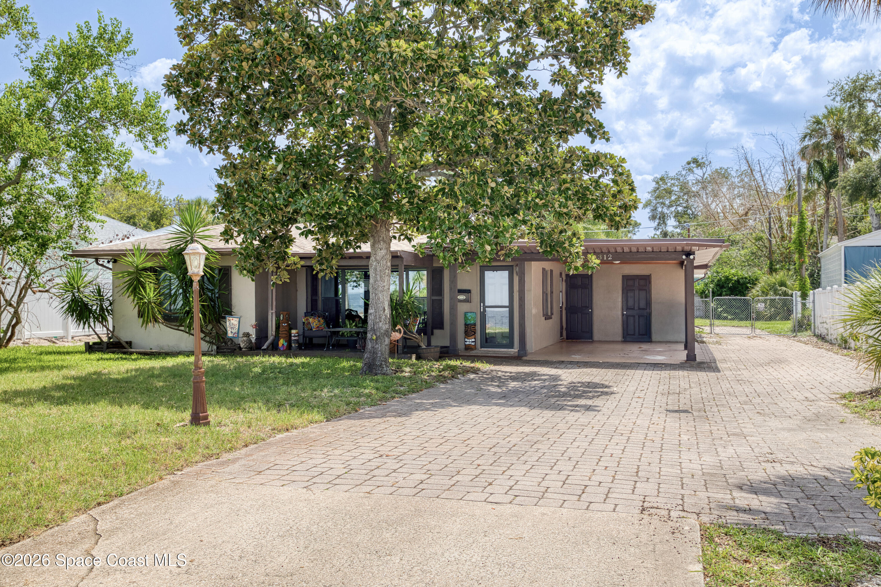1312 Riverside Drive Titusville, FL 32780 - Photo 1 of 57 Front of Home