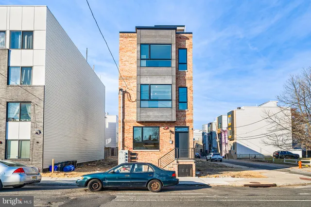 a car parked in front of a building