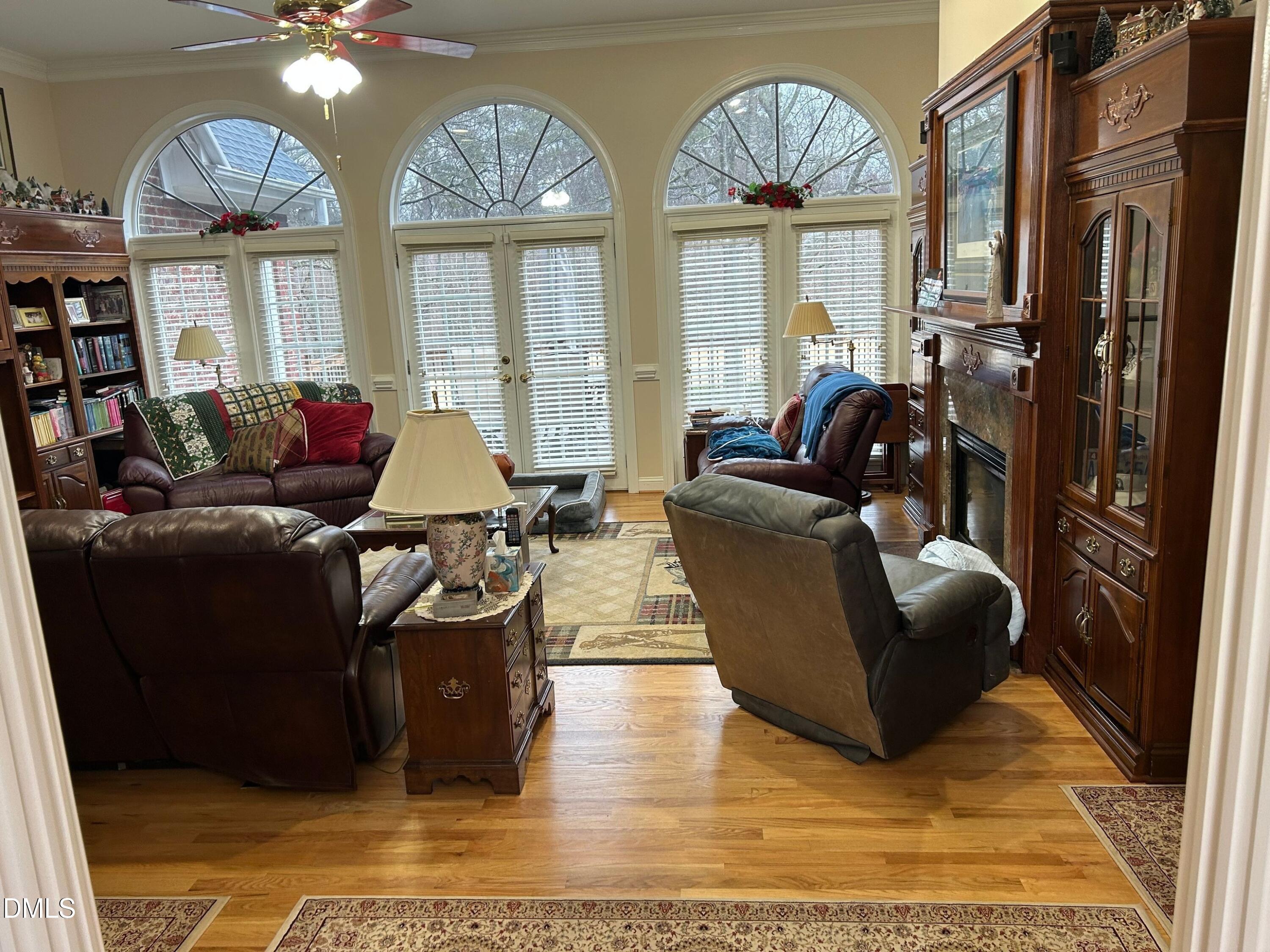 3608 Pauley Court Raleigh, NC 27610 - Photo 11 of 48 a living room with furniture and a large window