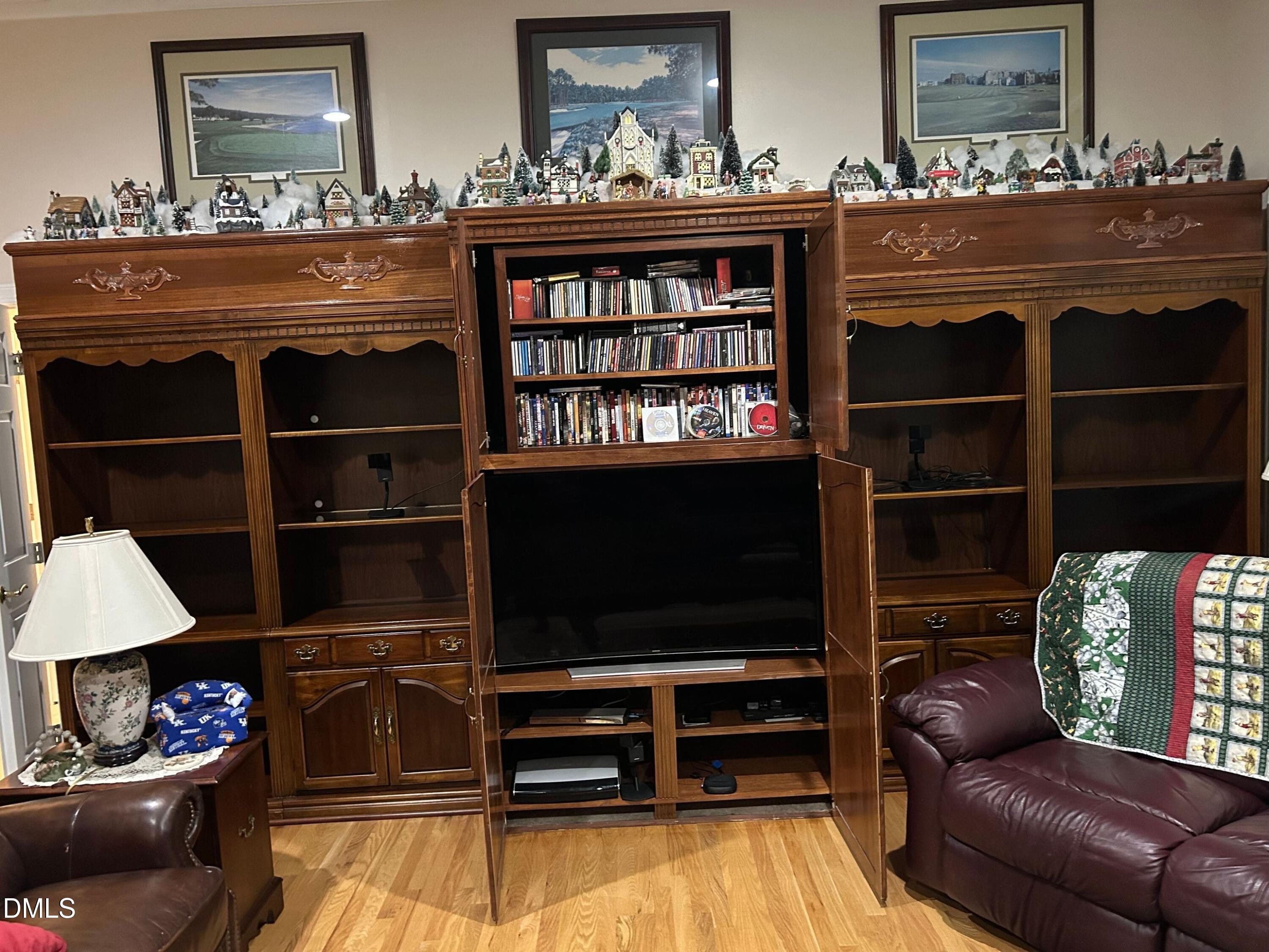 3608 Pauley Court Raleigh, NC 27610 - Photo 13 of 48 a living room with furniture and a flat screen tv
