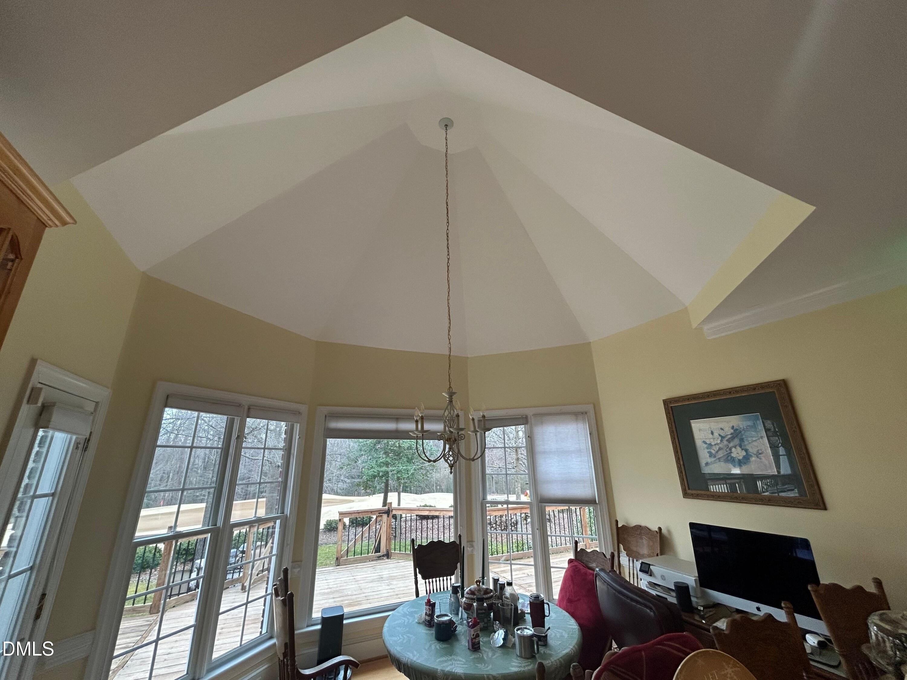 3608 Pauley Court Raleigh, NC 27610 - Photo 17 of 48 a living room with furniture large window and flat screen tv