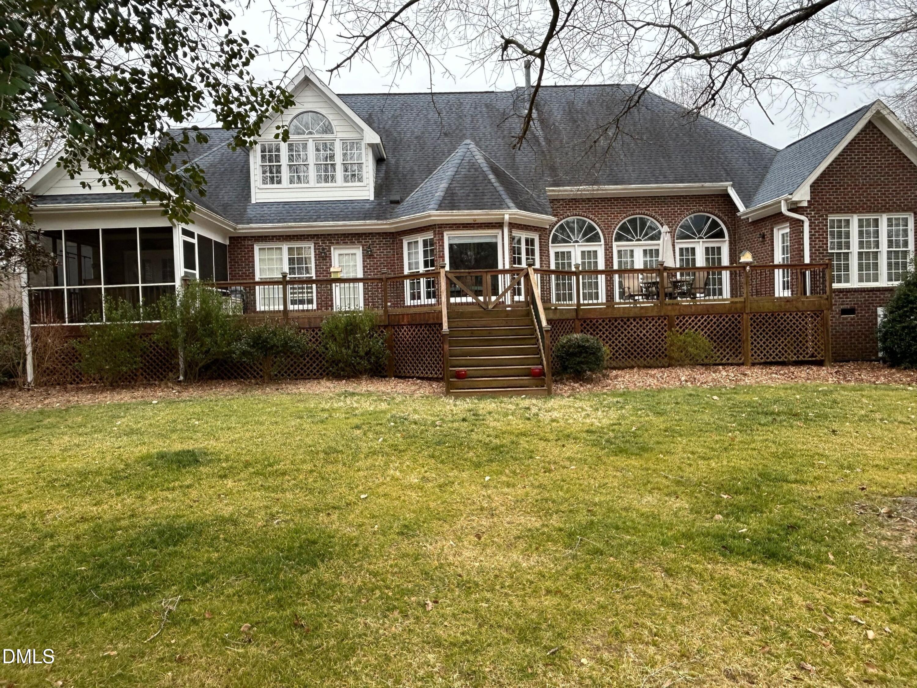 3608 Pauley Court Raleigh, NC 27610 - Photo 2 of 48 a front view of a house with a garden