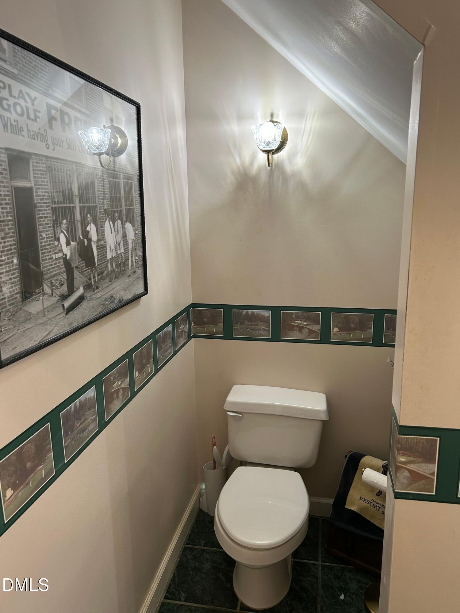 3608 Pauley Court Raleigh, NC 27610 - Photo 23 of 48 a white toilet sitting next to a shower