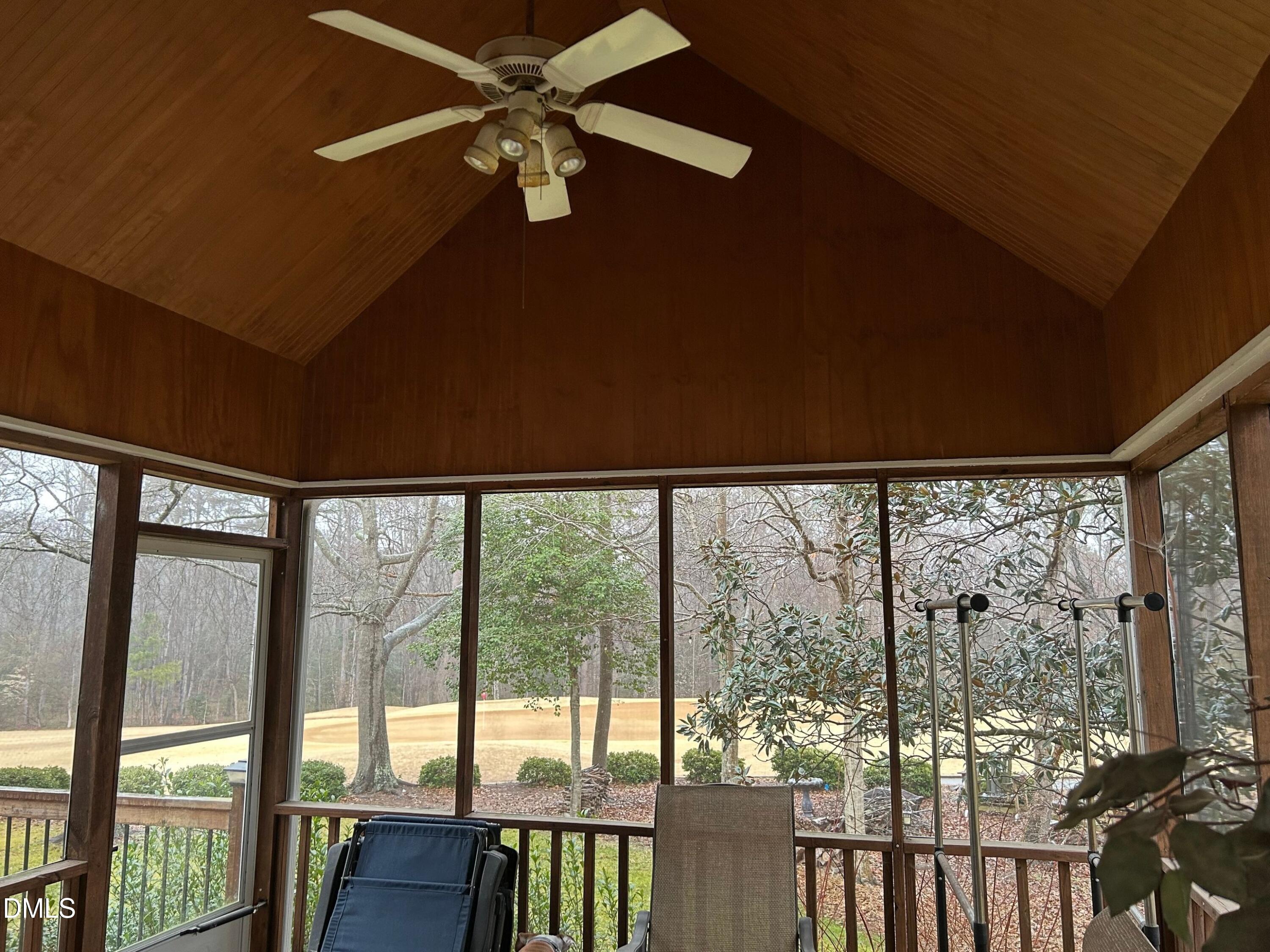 3608 Pauley Court Raleigh, NC 27610 - Photo 39 of 48 a view of a porch and a floor to ceiling window