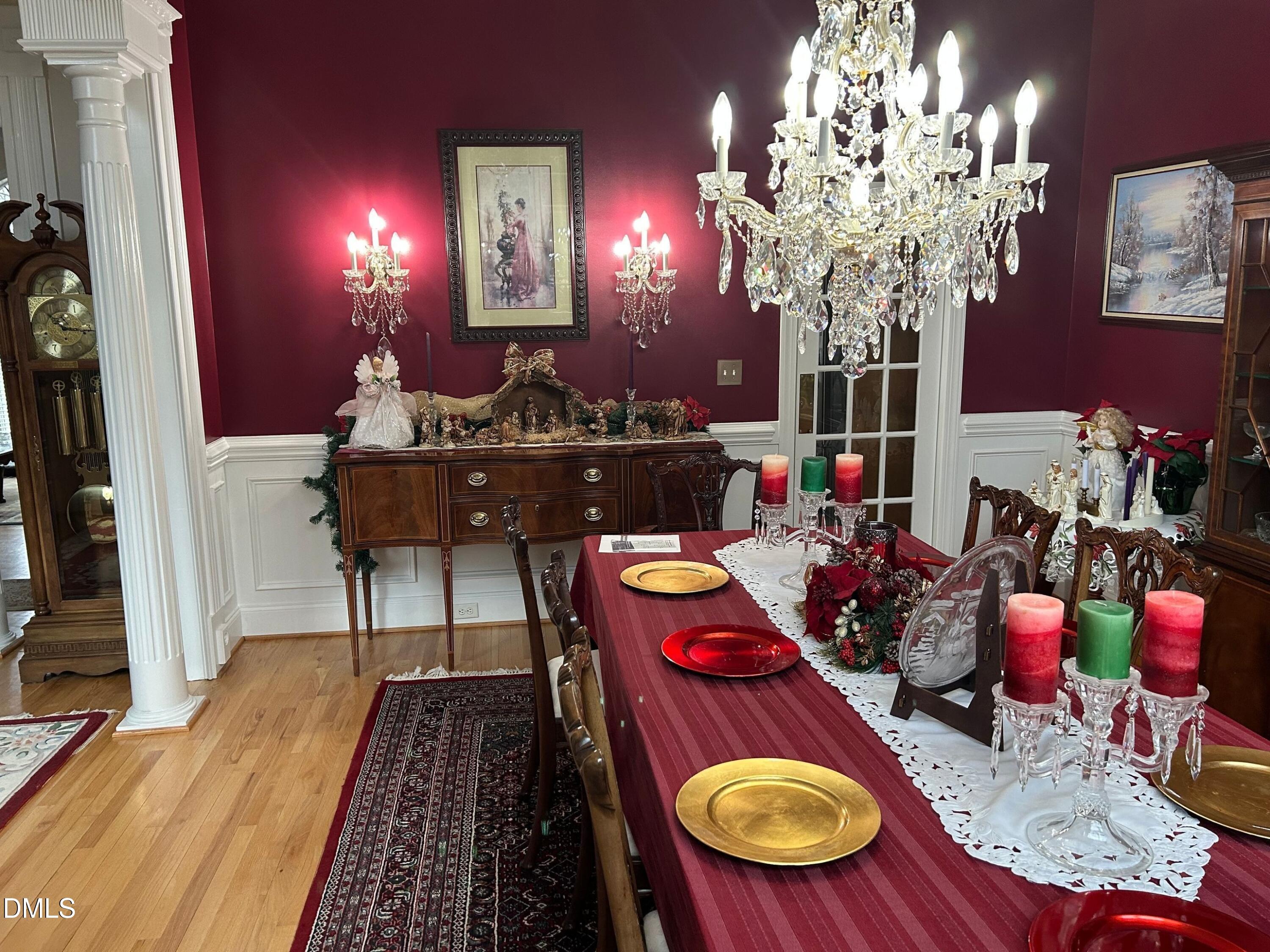 3608 Pauley Court Raleigh, NC 27610 - Photo 6 of 48 a view of a dining room with furniture and chandelier