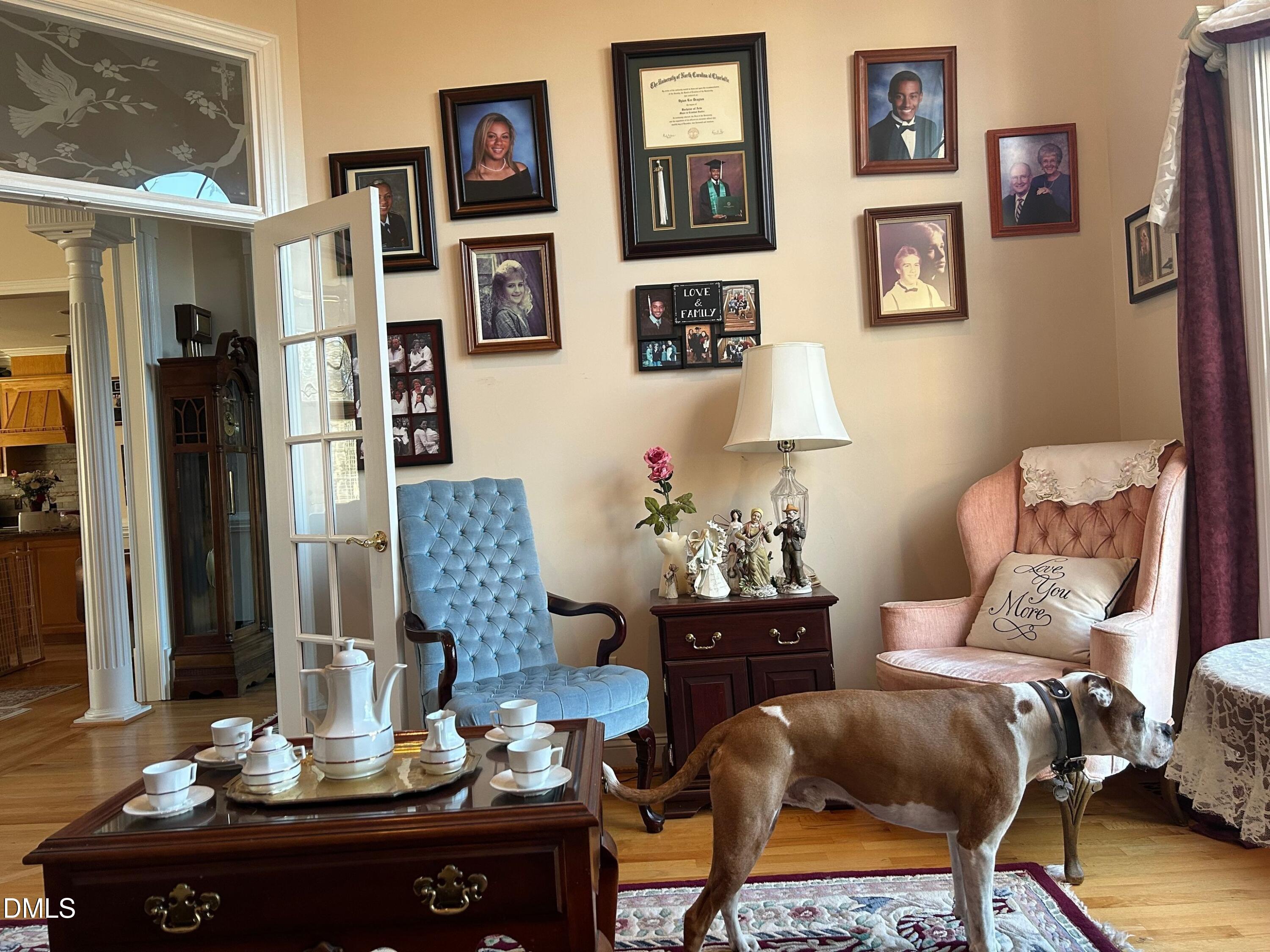 3608 Pauley Court Raleigh, NC 27610 - Photo 9 of 48 a living room with furniture and painting on the wall