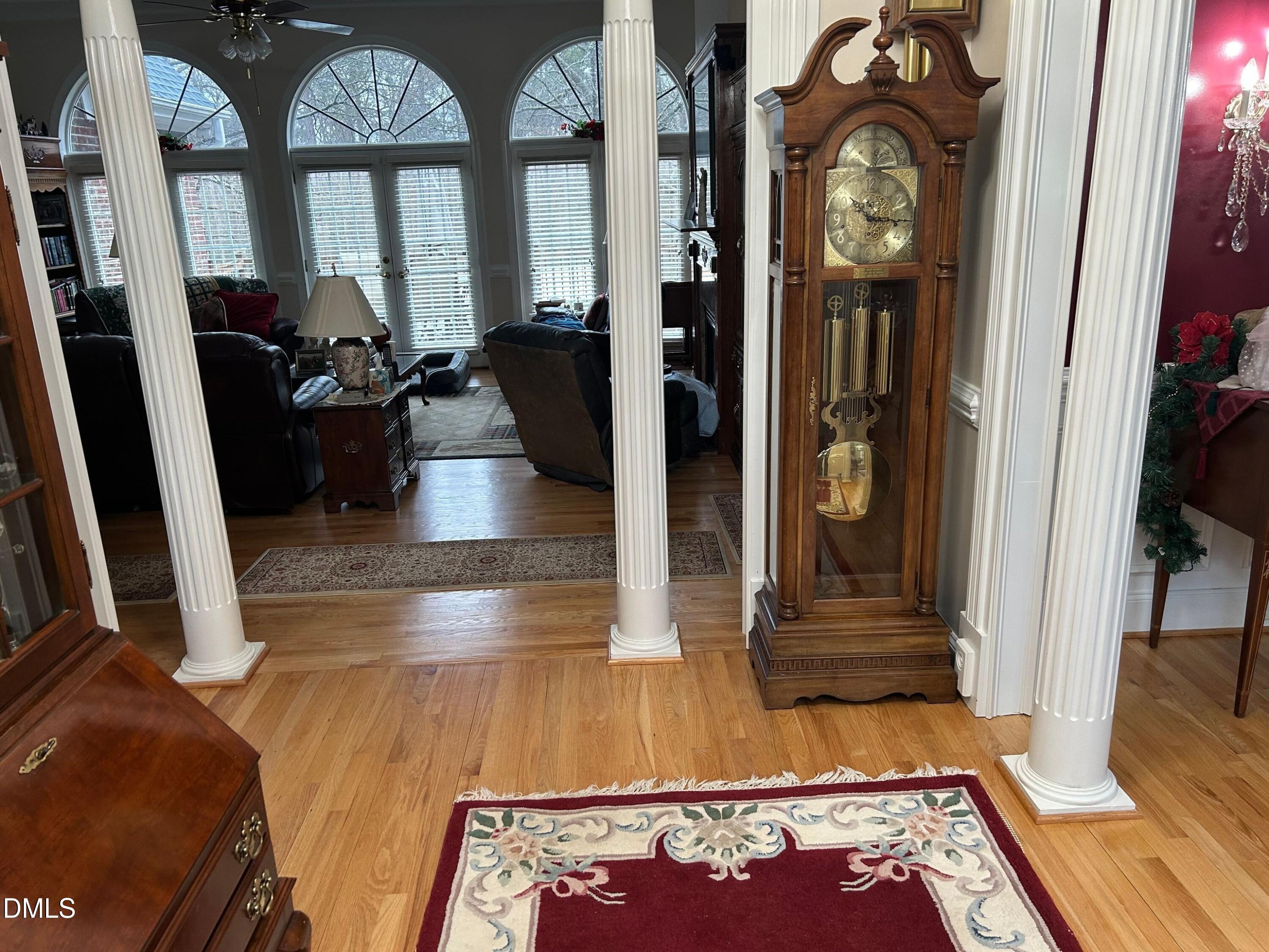3608 Pauley Court Raleigh, NC 27610 - Photo 10 of 48 a view of an entryway with wooden floor